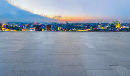 Floor tile observation deck and city building landscapeの写真素材