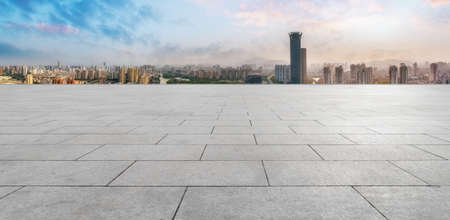 Floor tile observation deck and city building landscapeの写真素材