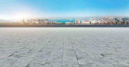 Square brick ground and modern buildingsの写真素材