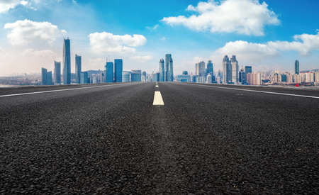Asphalt ground and urban building landscapeの写真素材