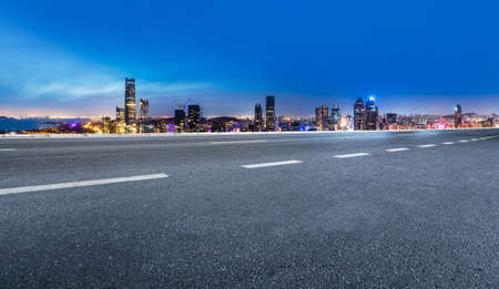 Asphalt ground and urban building landscapeの写真素材