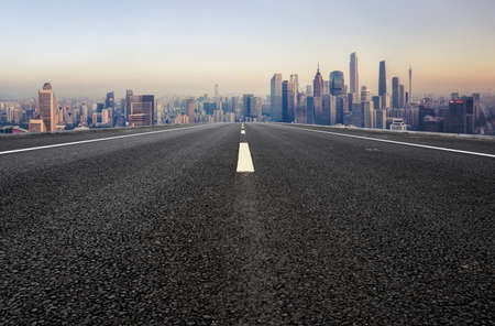 Asphalt ground and urban building landscapeの写真素材