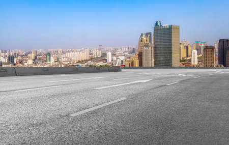 The road ahead and the urban architecture landscapeの写真素材