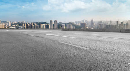The road ahead and the urban architecture landscapeの写真素材