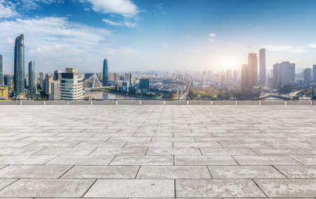 Square brick ground and city building landscapeの写真素材