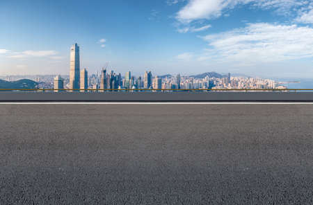 Asphalt ground and urban building landscapeの写真素材