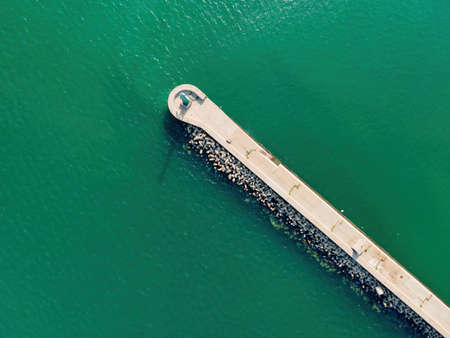 Aerial photography of Yantai coastline breakwater lighthouseの写真素材