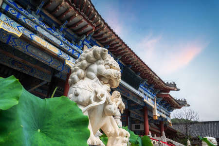 Street scene of stone lion in Chinese style gardenの写真素材