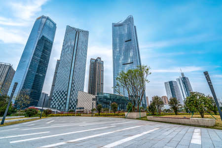 City road and modern office buildingsの写真素材