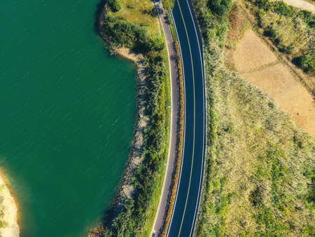 Aerial photography outdoor forest curve road close-upの写真素材