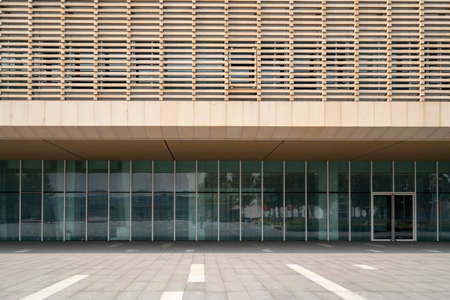 Partial view and glass of modern buildings in outdoor financial districtの写真素材