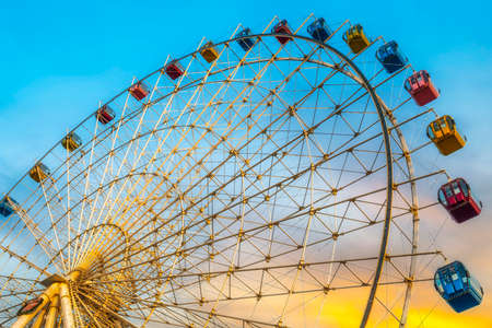 Outdoor spinning Ferris wheel ridesの写真素材