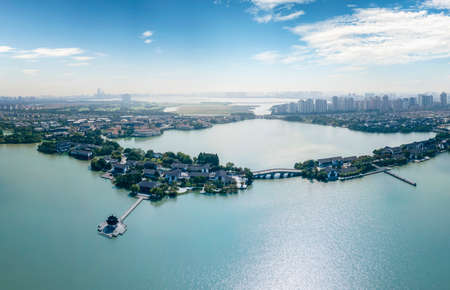 Aerial photography of Ligong Causeway Chinese Garden by Jinji Lake in Suzhouの写真素材