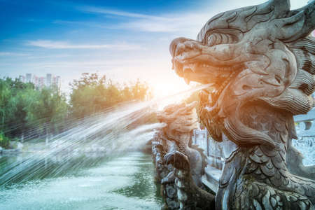 Chinese garden stone lion spray water landscapeの写真素材