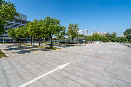 Open plaza parking lot and tiled floorsの写真素材