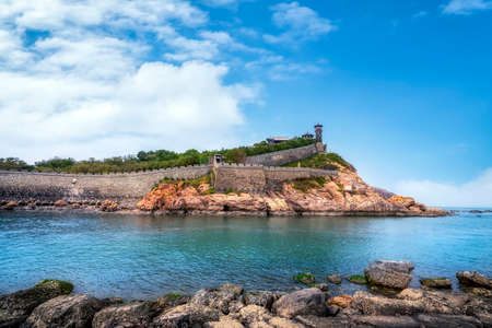 Aerial photography city coastline Penglai Pavilion ancient buildingsの写真素材