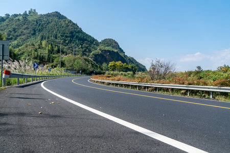 Outdoor forest asphalt road transportationの写真素材