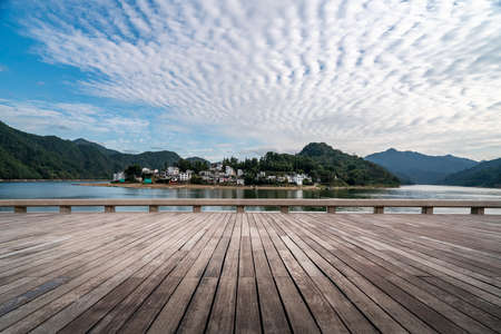 Wooden plank road and landscape village