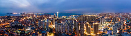 Aerial photography of Qingdao city buildings at nightの写真素材
