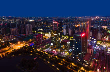 Aerial photography night view of Zibo city in Shandongの写真素材