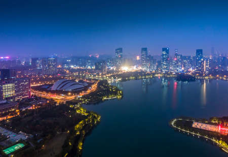 Aerial photography night view of Hefei Swan Lake Financial Centerの写真素材