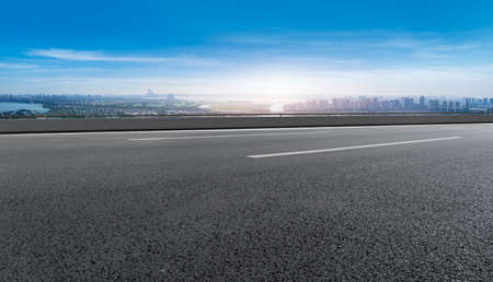 Asphalt ground and buildings landscape skylineの写真素材