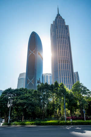 Partial landscaping and glass curtain wall of the office building in the outdoor financial districtの写真素材
