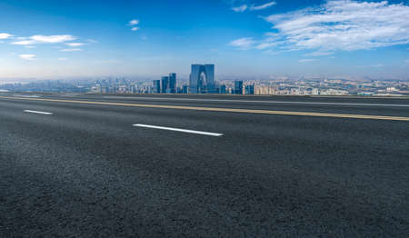 Asphalt ground and buildings landscape skylineの写真素材