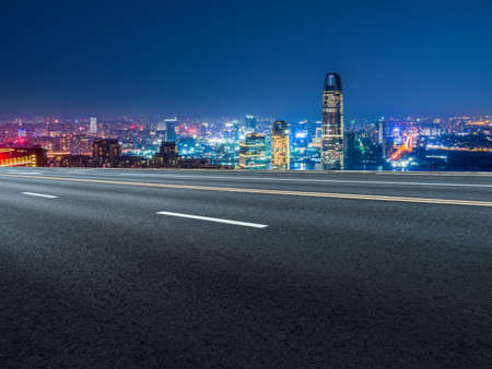 Outdoor asphalt and financial district buildingsの写真素材