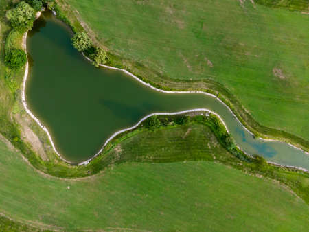 aerial photography outdoor city coastline green golf courseの写真素材