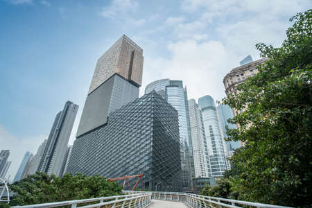 Facade and partial view of modern office building in financial districtの写真素材