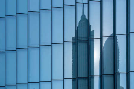 Facade and partial view of modern office building in financial district