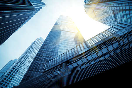 Facade and partial view of modern office building in financial districtの写真素材