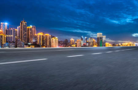 Night view of road lane and building landscapeの写真素材