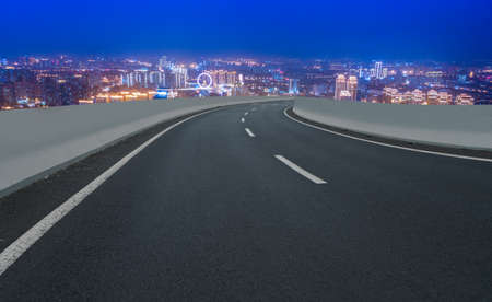 Night view of road lane and building landscapeの写真素材