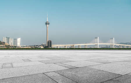 Floor tile observation deck and city building landscapeの写真素材