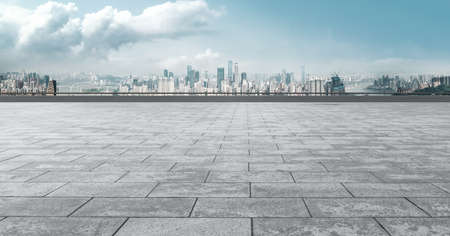 Square brick floor and city building viewの写真素材