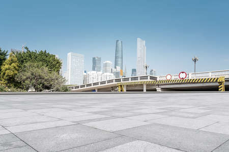 Square brick floor and city building viewの写真素材