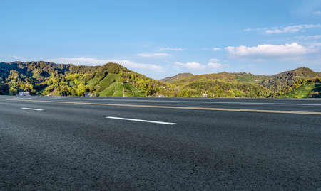 Outdoor asphalt ground and sky cloudsの写真素材