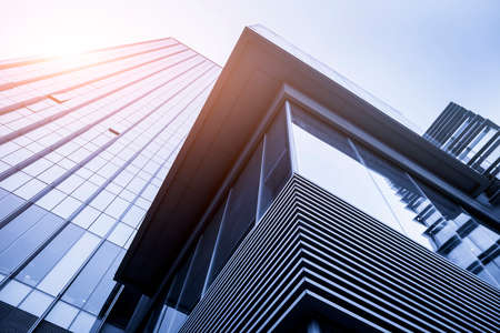 Exterior glass and partial view of modern office building in financial districtのeditorial素材