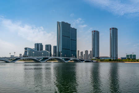 Street scene of modern buildings along the Minjiang River in Fuzhouのeditorial素材