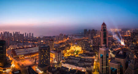 Aerial photography of Qingdao Bay city night scene large formatの写真素材