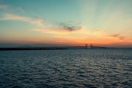 Qingdao sea-crossing viaduct and sunsetの写真素材