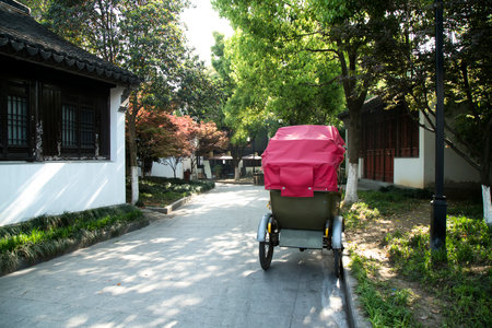 Chinese garden rickshaw street sceneのeditorial素材