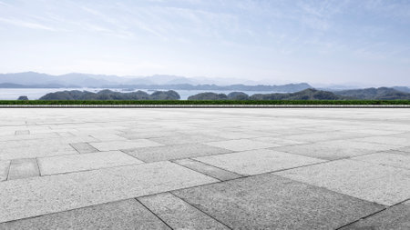 Empty square floor and mountain natural scenery under blue sky in Hangzhouの写真素材