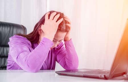 Asian businesswoman sitting headache with failure and stressed from work in office about his...