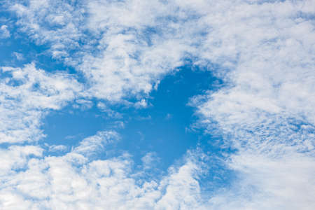 Beautiful blue sky and white fluffy clouds for background.