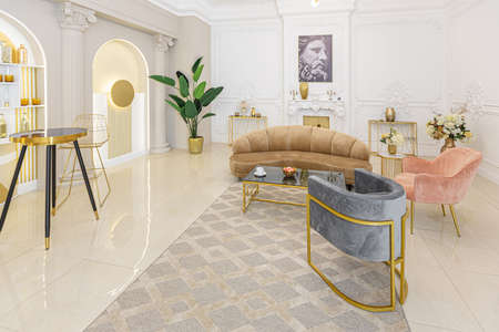 chic luxury interior in an old antique style open-plan apartment decorated with columns and stucco on the wall in pastel colors. tiles on the floor. beige wallsの写真素材