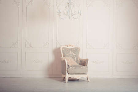 luxury clean bright white interior. a spacious room with sunlight and flowers in vases
