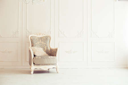 luxury clean bright white interior. a spacious room with sunlight and flowers in vasesの写真素材